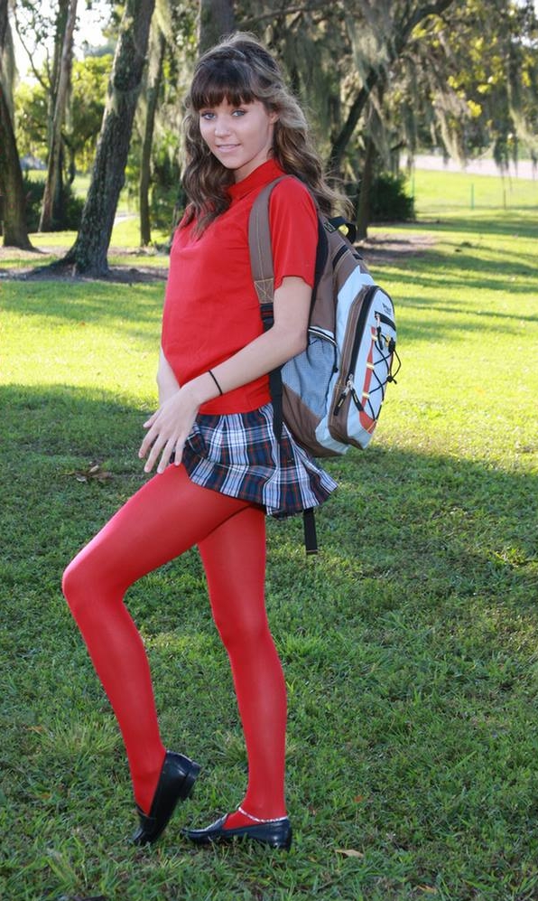 Auburn Schoolgirl wearing Red Opaque Pantyhose and Black Shoes